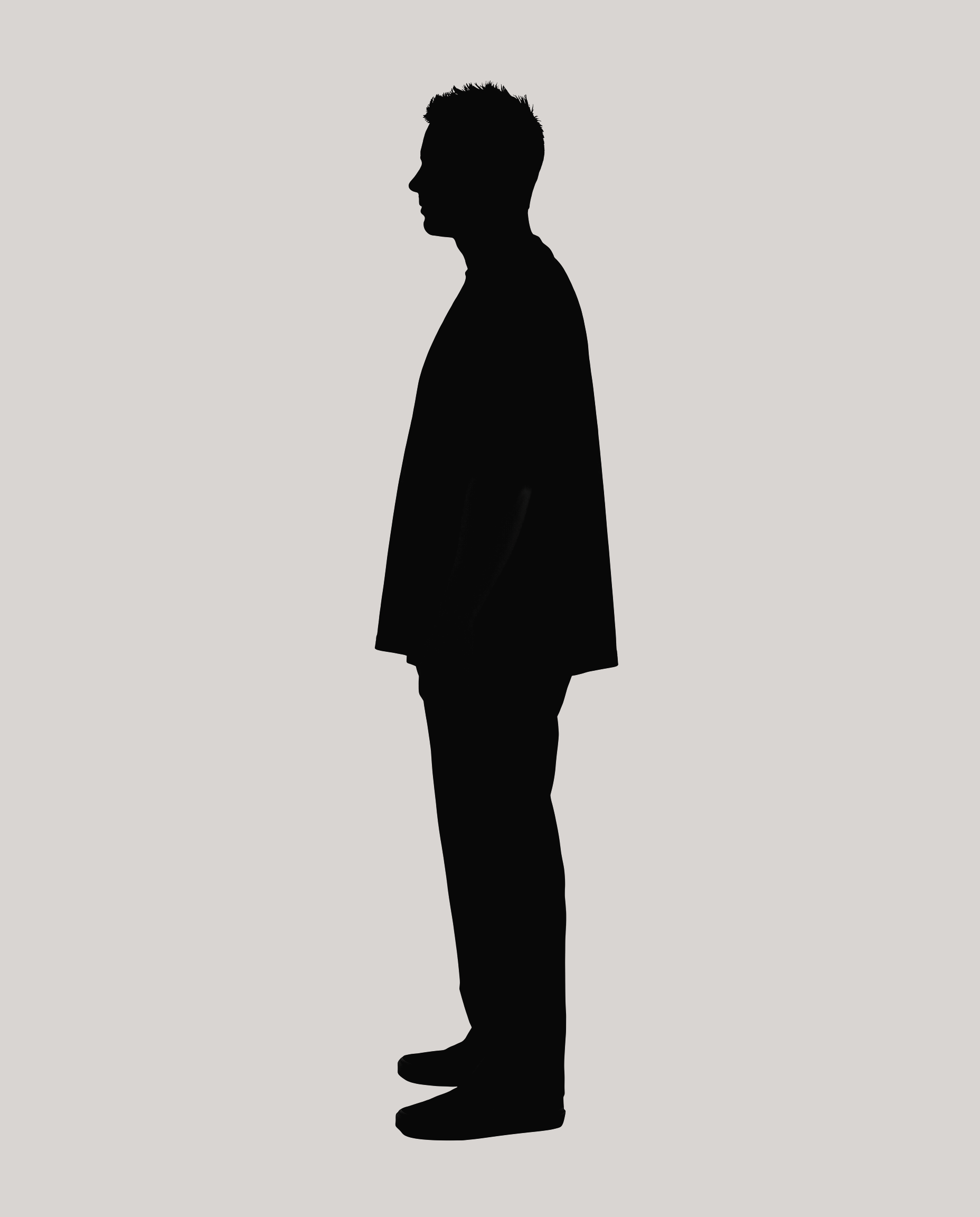 A dark silhouette of Rich Tangney standing in profile against a flat pale grey background.